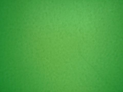 Green fabric background. – Slide 6