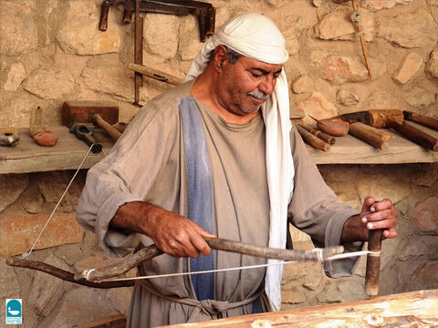Some carpenters worked with a bow drill. A bow string would be twisted so it could turn a drill. It could also turn wood, allowing the carpenter to shape it with chisels, a form of early lathe. – Slide 11