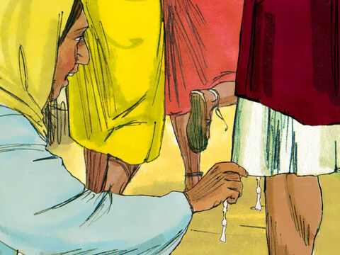 The woman reached down and touched the edge of Jesus’ garment. Immediately her bleeding stopped and she felt well. Note: On the four corners of the Jewish prayer shawl were four tassels, or tzitziyot. These tassels were to remind each Jewish man of his responsibility to fulfill God's commandments but also came to represent that man’s authority (Numbers 15:37-41). – Slide 7