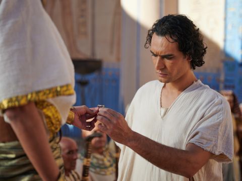 So, Pharaoh asked his officials, ‘Can we find a man like Joseph, one in whom the Spirit of God is present?’ Pharaoh said to Joseph, ‘As God has enabled you to know all this, there is no one as wise and discerning as you are! You will oversee my household, and all my people will submit to your commands. Only I, the king, will be greater than you. <br/>Then Pharaoh took his signet ring from his own hand and put it on Joseph. – Slide 11