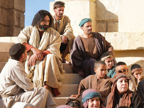 Jesus sat down in the Temple opposite the place where people gave their offerings. – Slide 1