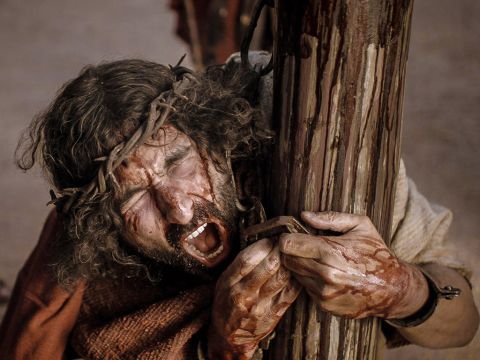 9: Isaiah’s Prophecy About the Suffering Messiah, Jesus. <br/>Isaiah 53:5-6 <br/>But He was pierced for our rebellion, crushed for our sins. He was beaten so we could be whole. He was whipped so we could be healed. All of us, like sheep, have strayed away. We have left God’s paths to follow our own. Yet the Lord laid on Him the sins of us all.  <br/>John 19:30 <br/>When Jesus had tasted it, He said, ‘It is finished!’ Then He bowed His head and gave up His spirit. – Slide 9