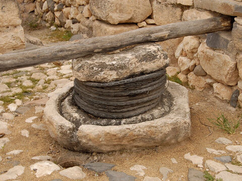 Baskets of olives were put under the crushing stone. – Slide 21