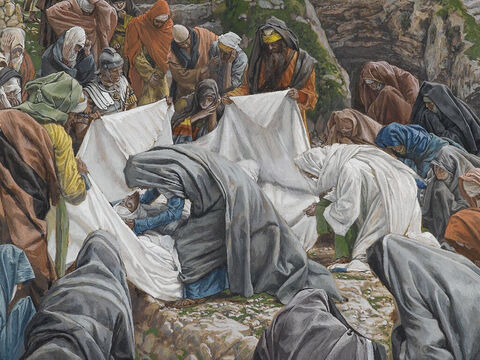 This was in accordance with Jewish burial customs. <br/>(John 19:40). <br/>Mary Kisses the Face of Jesus Before He is Enshrouded on the Anointing Stone - – James Tissot – Brooklyn Museum. – Slide 7